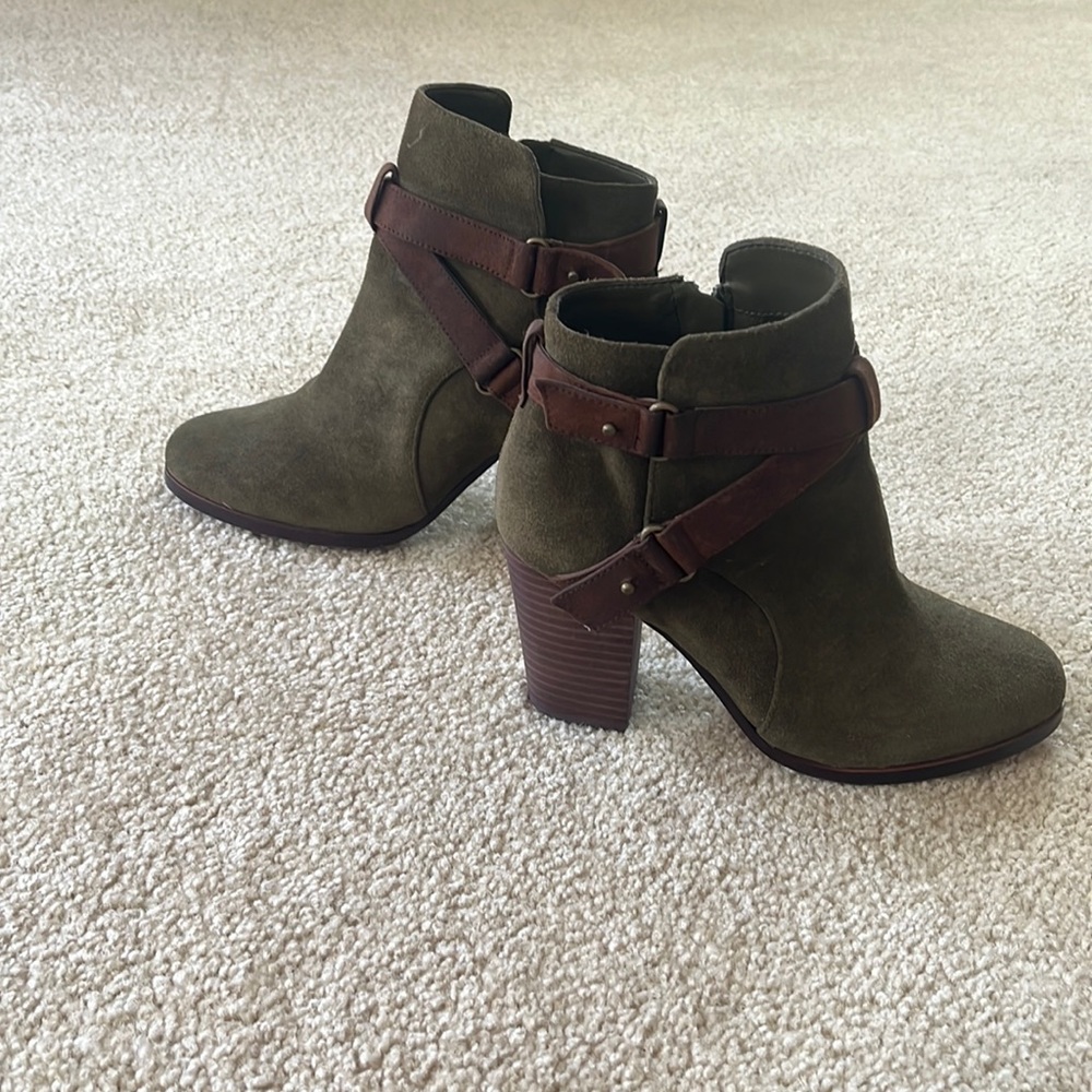Sage green boots with brown straps. Zip up. Never worn.